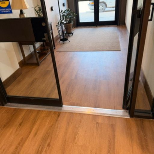 Edward Jones entryway with wood look floors